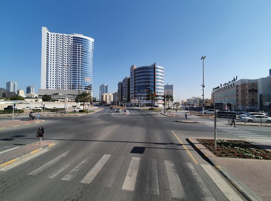 صورة توضح ملامح منطقة البستان في الإمارات مع شوارعها المنظمة والمباني السكنية والخدمات المحيطة.